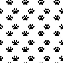 Dog paw print seamless textile pattern. Traces of Cat. Vector seamless background.
