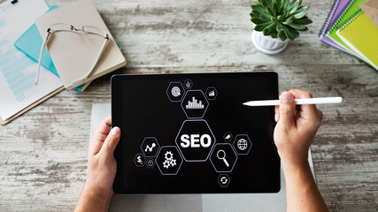 SEO - Search engine optimization. DIgital marketing concept on screen.