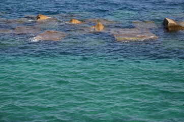 Some photos of the beautiful green and blue sea around Syracuse in Sicily taken during the summer.