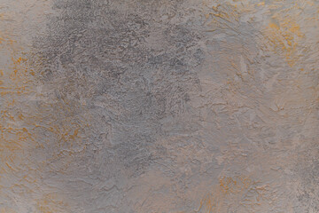 decorative putty texture with grey and golden paint smears