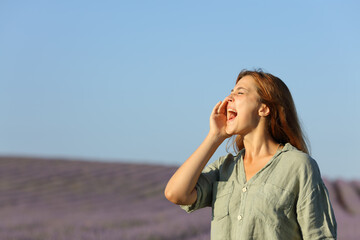 Woman screaming in a lavender field