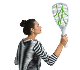 Young woman with electric fly swatter on white background. Insect killer