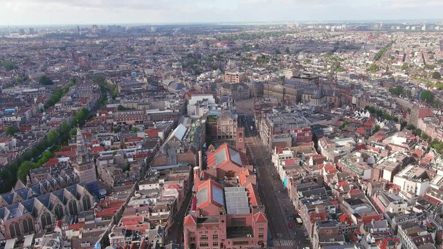 Amsterdam: Aerial view of capital city of Netherlands, Royal Palace Amsterdam (Koninklijk Paleis Amsterdam) and Dam Square in historic center of city - landscape panorama of Europe from above