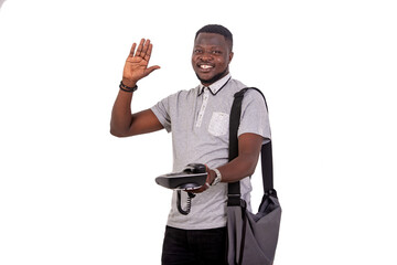 young man raising hand while giving mobile phone smiling.