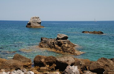 The rocky coastline at Skopelos Town on the Greek island of Skopelos.