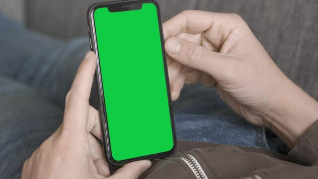 Single Tapping and Holding a Green Screen iPhone