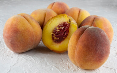 Image of ripe apricots on a wooden table close-up