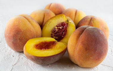 Image of ripe apricots on a wooden table close-up