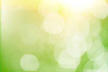 The background image and bokeh are in a green, orange and white circle.