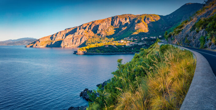 Asphalt road to Acquafredda town. Marvelous morning scene of Italy, Europe. Aerial summer seascape of Mediterranean sea. Traveling concept background..