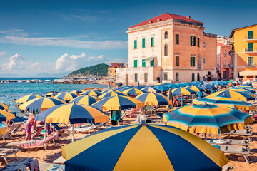Hot summer dey on Santa Maria di Castellabate puclic beach. Picturesque outdoor scene of Italy,...