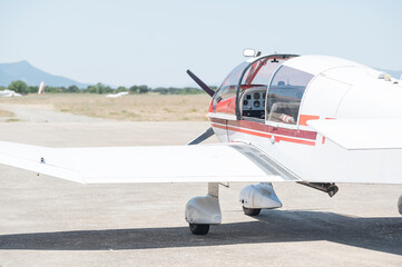 Small plane cockpit on the airfield runway