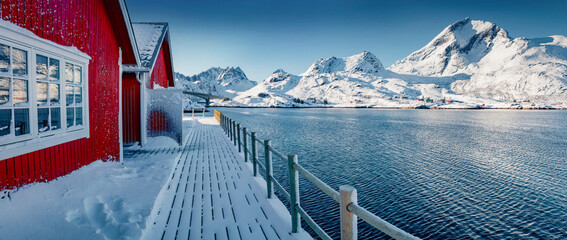 Panoramic winter view of small fishing village - Molnarodden with Kakernbrua bridge on background, Lofoten Islands, Norway, Europe. Splendid morning seascape of Norwegian sea, Islendingen fjord.