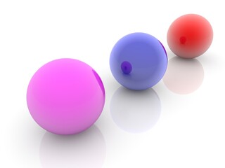 Three colored balls in a row on white