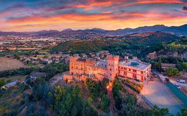 Obraz premium Majestic morning view from flying drone of Castelluccio Castle. Great sunrise on Battipaglia town, Italy, Europe. Traveling concept background.
