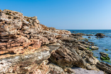 Fototapeta na wymiar Eroded rock formations on the seashore near the village of shabla