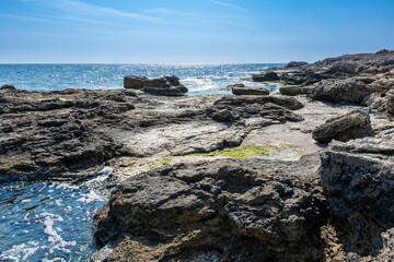 Fototapeta na wymiar Eroded rock formations on the seashore near the village of shabla