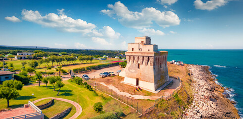 View from flying drone of Torre Mileto tower. Aerial summer scene of Apulia, Italy, Europe....