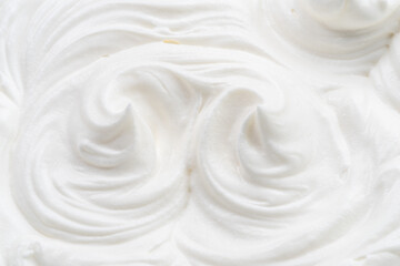 Pics and waves in yoghurt or cream surface. Top view.