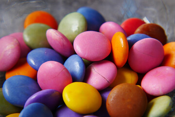 Fototapeta na wymiar multi-colored sweet candies in a bowl close up 
