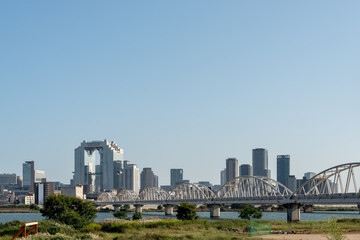 Fototapeta na wymiar Bridge over Yodo river for the center of Osaka city
