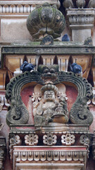 Fototapeta na wymiar Stone carvings on Shri Rama Chandra temple gopura, Ammapalli, Shamshabad, Telangana, India.