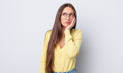 hispanic pretty woman feeling bored, frustrated and sleepy after a tiresome, dull and tedious task,...