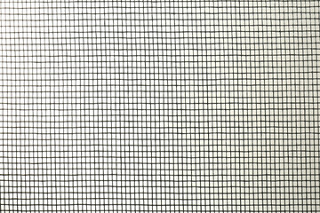 Closeup view of mosquito window screen on white background