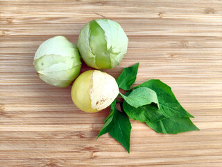 physalis (physalis, golden, gooseberry) isolated on wooden background