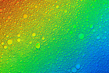 Аbstract image of oil and water bubbles of various colors. Colorful artistic image of oil drop on water for modern and creation design background