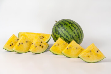 ripe watermelons on a white background and on melons