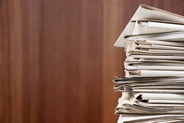Old manuscripts lie in a stack, beautiful paper background,