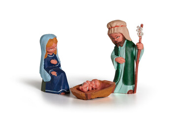 Christmas nativity scene of born child baby Jesus Christ in the manger with Joseph and Mary in...