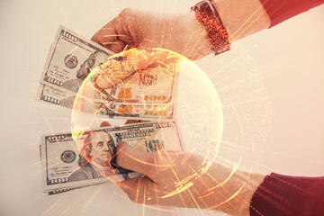 Multi exposure of social network theme drawing hologram and USA dollars bills and man hands.