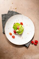 Avocado toast with cheese on plate top view