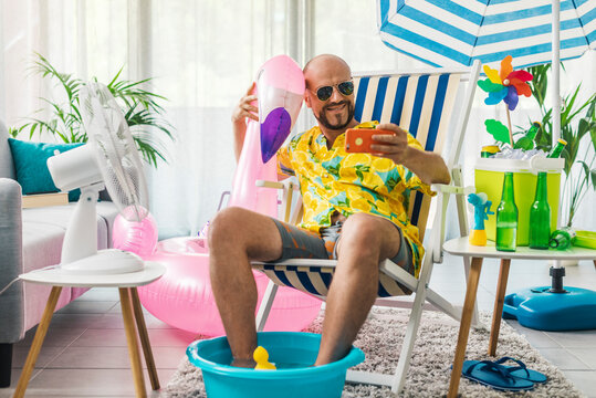 Man Spending Summer Vacations At Home And Taking Selfies