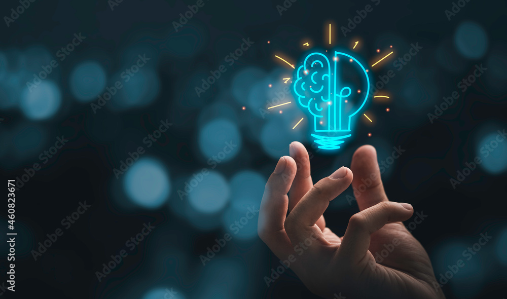 Poster hand holding drawing virtual lightbulb with brain on bokeh background for creative and smart thinkin
