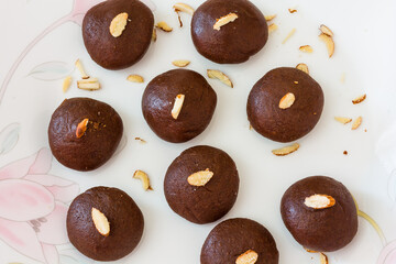 Dark chocolate truffle is made from chocolate,cocoa powder,milk and sugar. In India,this dessert is called chocolate peda.