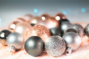 Silver, green, and gold Christmas baubles