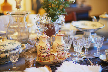 Pitchers and crystal glasses on a Parisian flea market