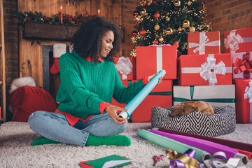 Full length photo of young african woman happy positive smile paper gift christmas holiday winter animal indoors