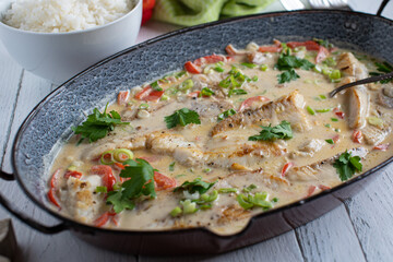 Fish with coconut milk and vegetable