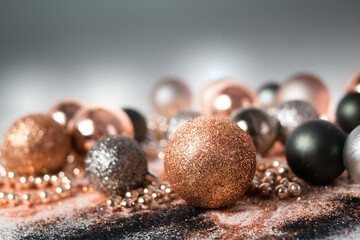 Silver, green, and gold Christmas baubles