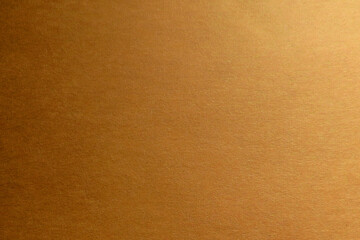 Paper textured background. The color of the paper is orange. Place for text