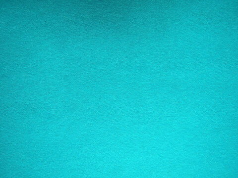 Paper textured background. The color of the paper is blue. Place for text
