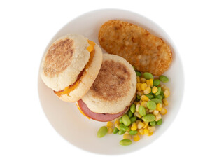 fried eggs with bacon and vegetables