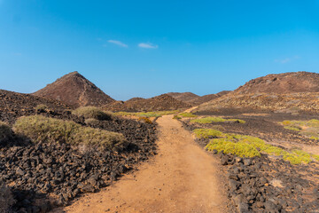Path to the north of the Isla de Lobos, along the north coast of the island of Fuerteventura, Canary Islands. Spain