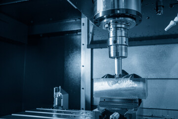 The CNC milling machine rough cutting the injection mold parts by indexable  endmill tools.
