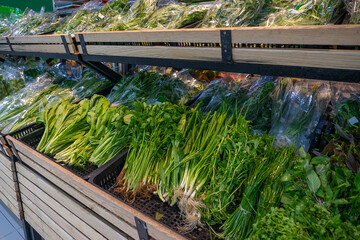 Fresh herbs on the counter of the grocery shop - 460828897