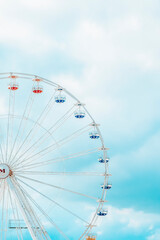 Part of a ferris wheel with the sky in the background on Le Havre beach in France